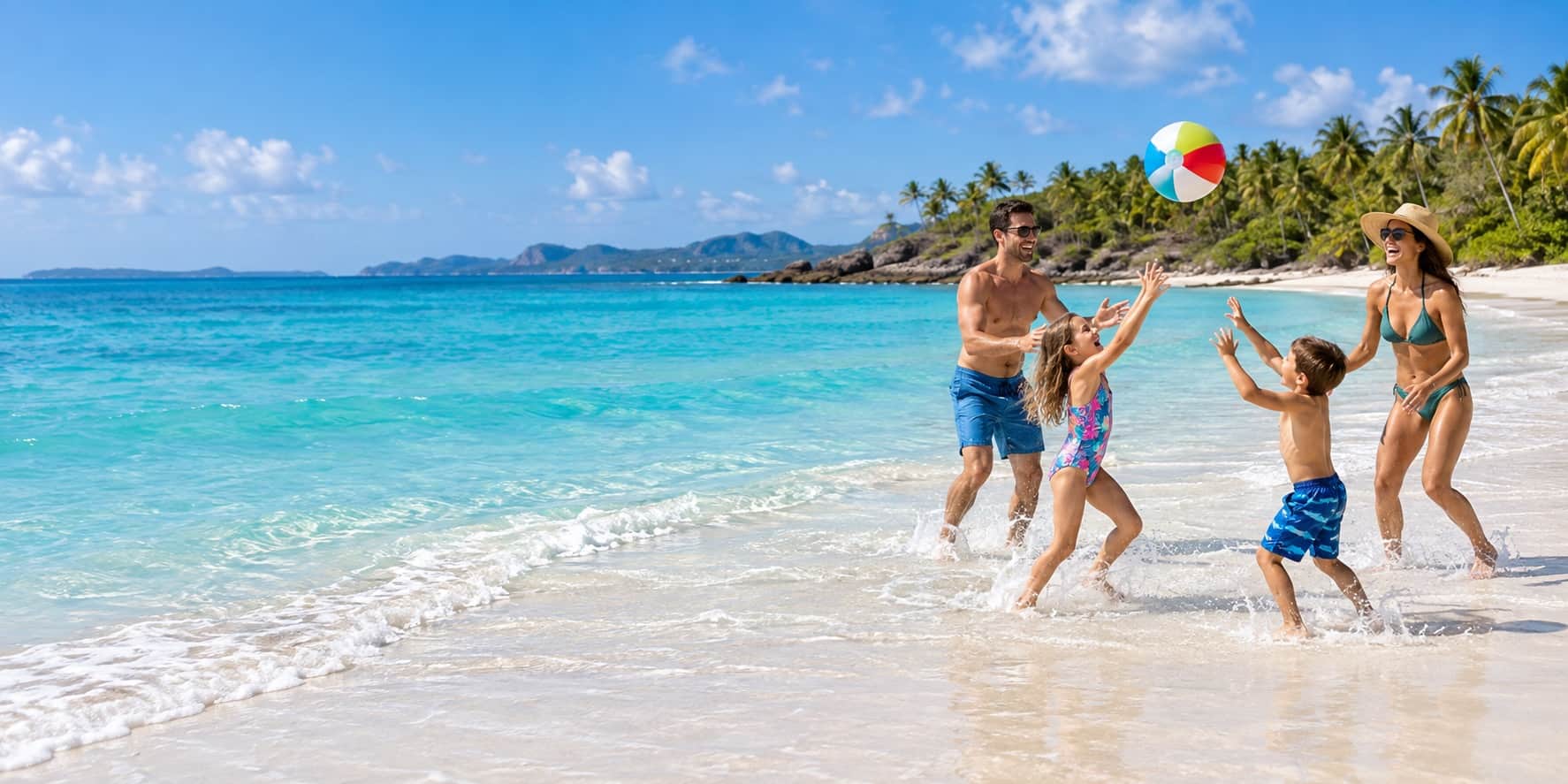 Turquoise tropical beach with white sand and palm trees