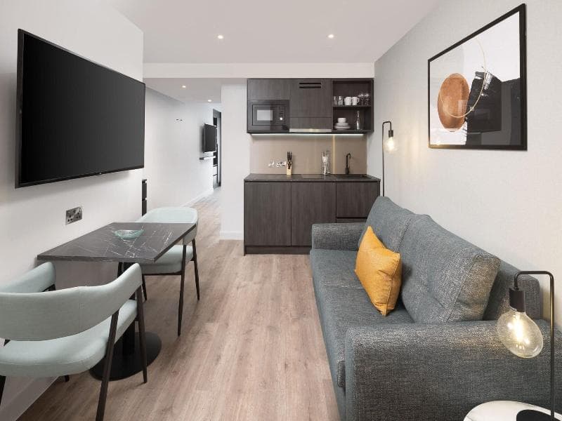 Suite, King and Sofa Bed, 1 Bedroom — image 1 of 14