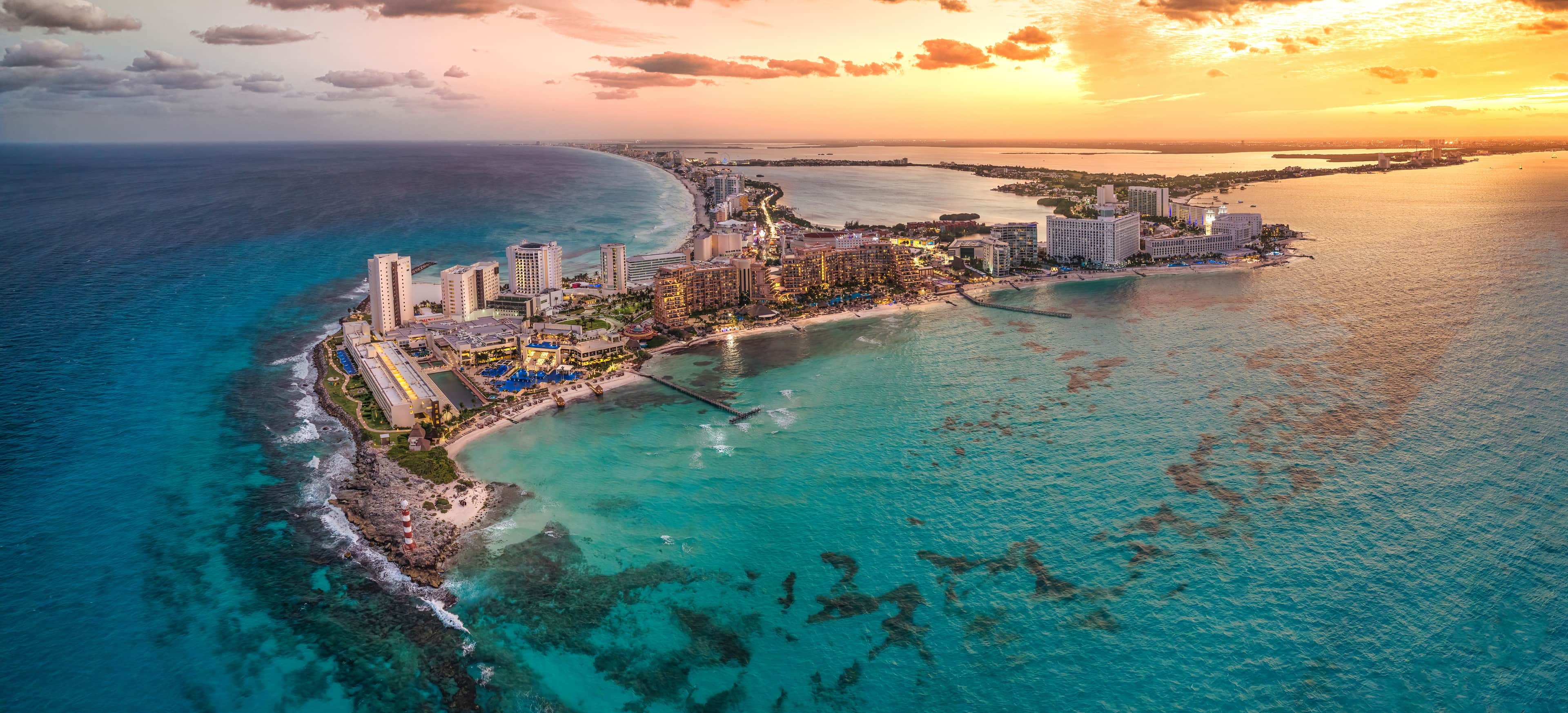 An aerial view of the Cancun hotel-zone strip between the turquoise Caribbean and the lagoon, Mexico